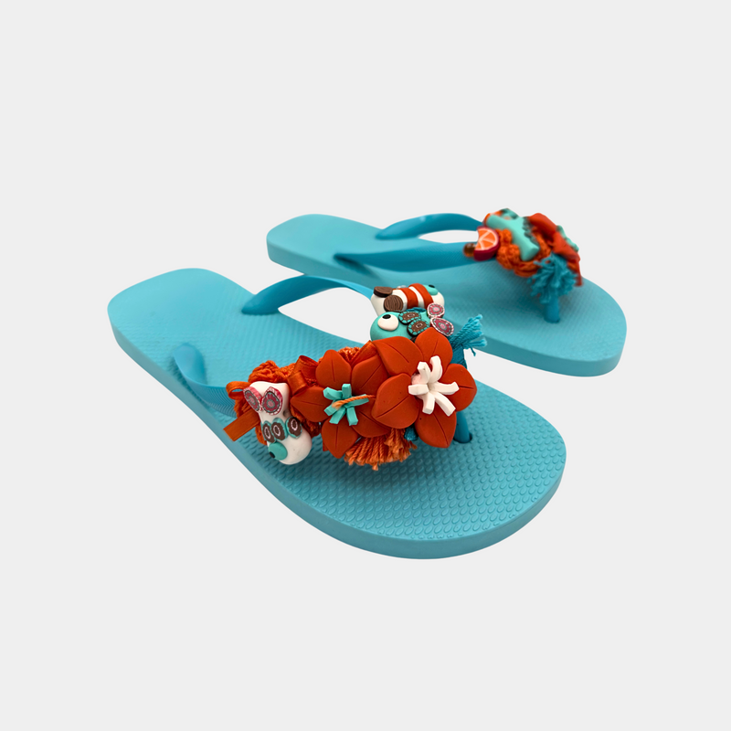 Flip flops turchese con fiori e pesciolini arancioni