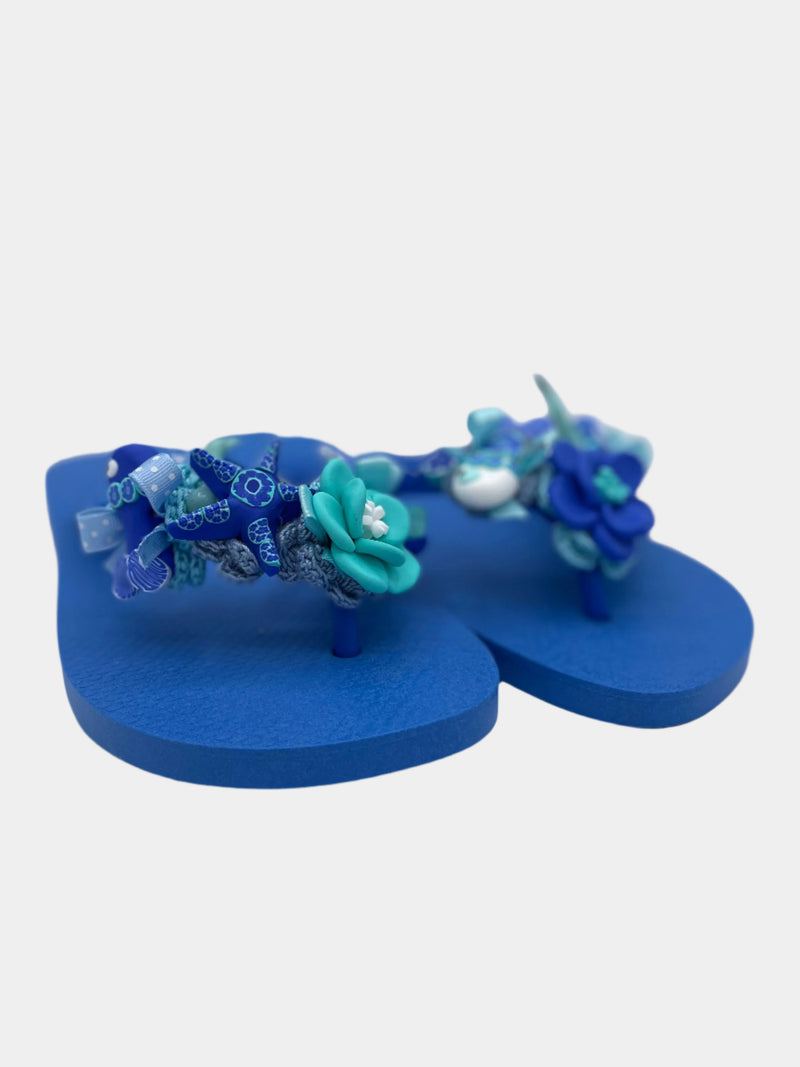 Flip-Flops azzurre con pesci e coralli
