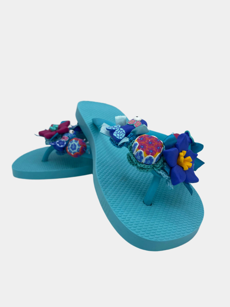 Flip-Flop turchese con fiori blu e pesci