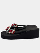 Flip-Flops con zeppa nere con fascetta in tessuto dettagli pesciolini e fiori